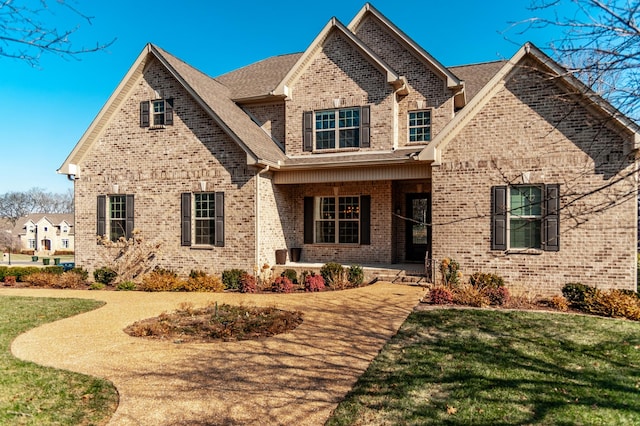 view of front of house with a front lawn