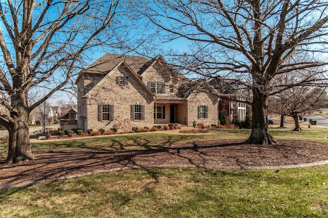 view of front of home with a front lawn