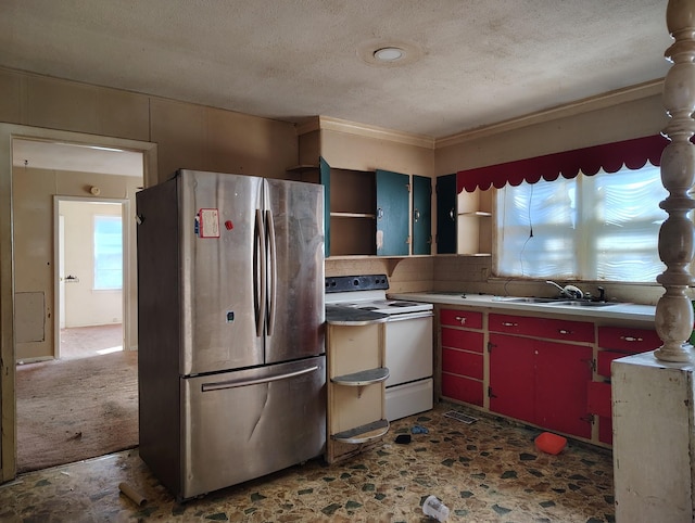 kitchen with sink, stainless steel fridge, a textured ceiling, and white range with electric stovetop