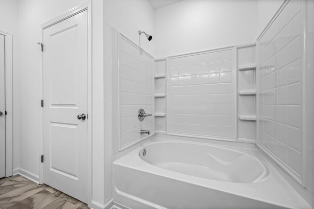 bathroom with shower / tub combination