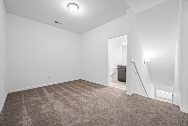 empty room featuring carpet flooring