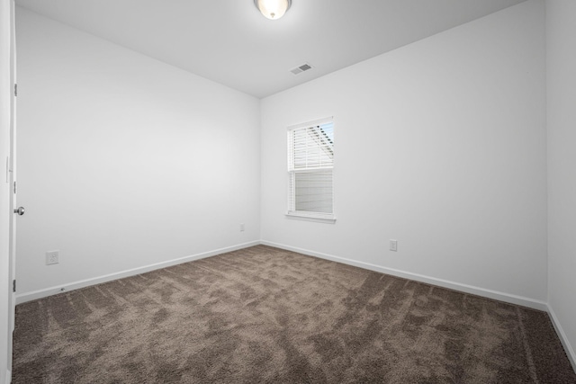 spare room with carpet