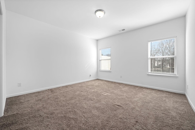 view of carpeted spare room