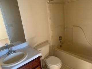 full bathroom featuring shower / tub combination, vanity, and toilet