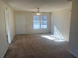 interior space featuring ceiling fan