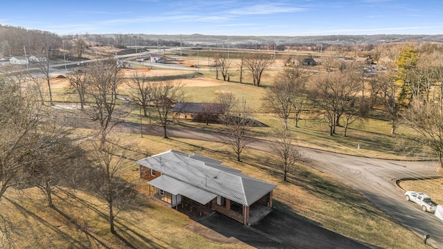 birds eye view of property featuring a rural view