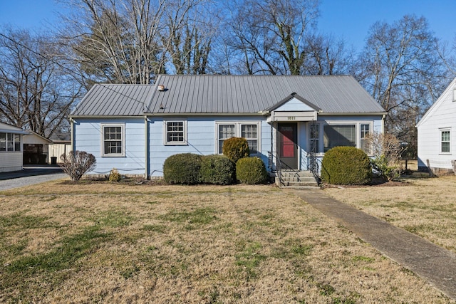 view of front of home with a front lawn