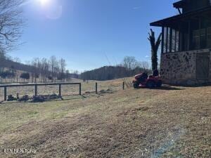 view of yard featuring a rural view