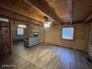 bonus room featuring wood-type flooring, wooden ceiling, and beamed ceiling