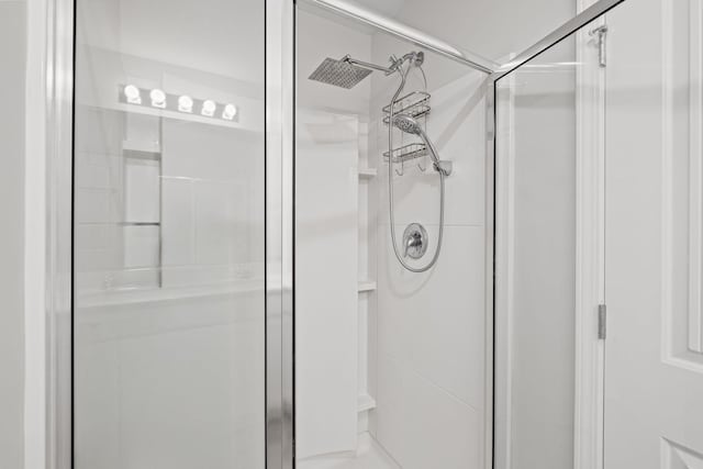 bathroom featuring walk in shower