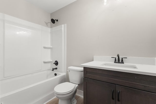 full bathroom featuring shower / bathtub combination, vanity, toilet, and baseboards