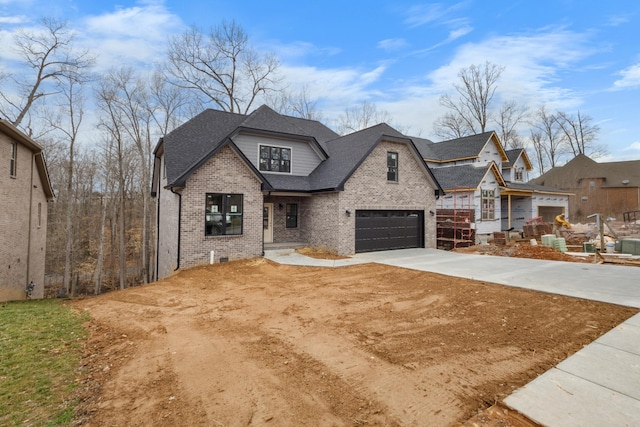 view of front of property with driveway, crawl space, a shingled roof, and brick siding