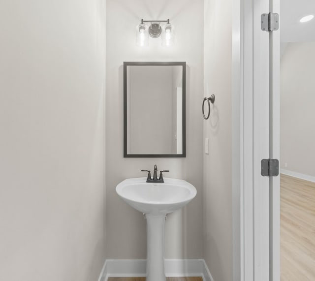 220 Birnam Wood Trce, Clarksville, TN 37043 - bathroom with baseboards and wood finished floors