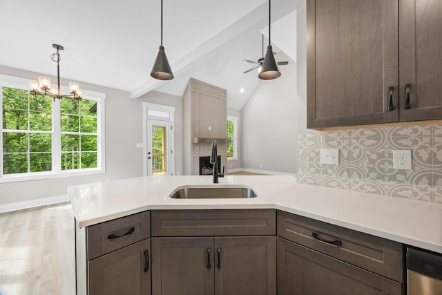 220 Birnam Wood Trce, Clarksville, TN 37043 - kitchen featuring a sink, light countertops, a chandelier, pendant lighting, and lofted ceiling