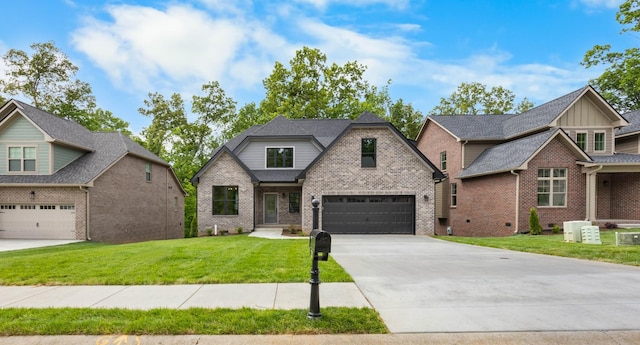 220 Birnam Wood Trce, Clarksville, TN 37043 - view of front of home with brick siding, driveway, a front lawn, and an attached garage