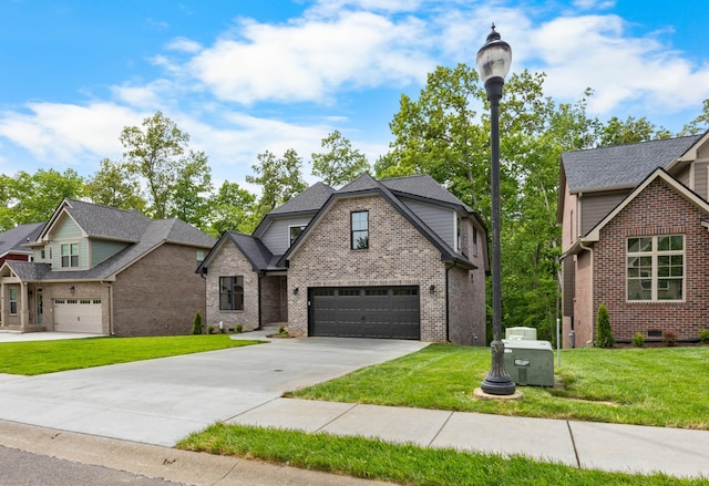 220 Birnam Wood Trce, Clarksville, TN 37043 - view of front of home featuring concrete driveway, brick siding, a front lawn, and a garage