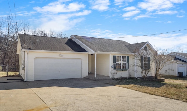 ranch-style home with a garage