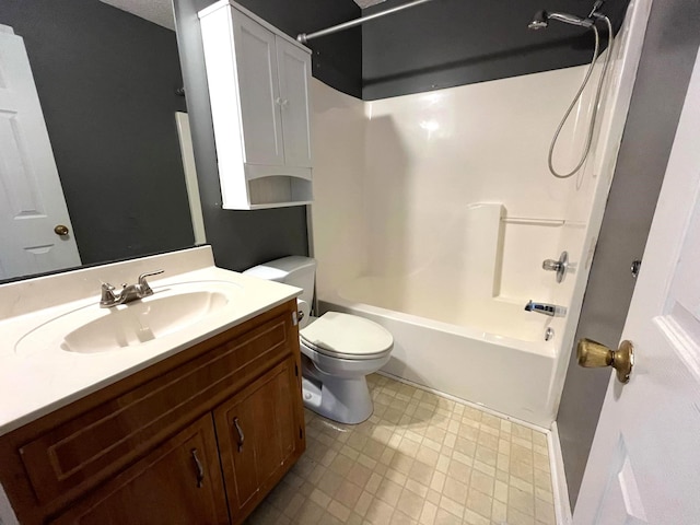 full bathroom featuring vanity, shower / washtub combination, and toilet