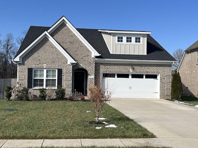 view of front facade featuring a garage and a front lawn