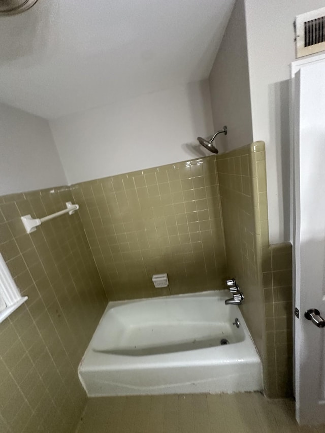 bathroom featuring tub / shower combination