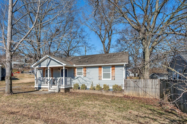 view of front facade with a porch and a front yard