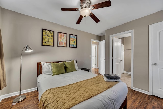 bedroom with dark wood-type flooring and ceiling fan