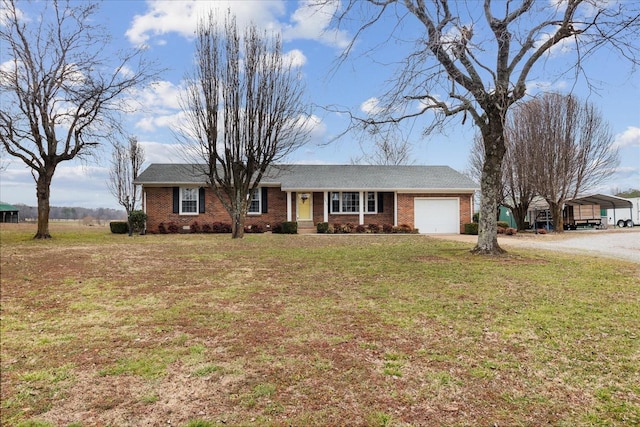 single story home with a garage, a carport, and a front yard