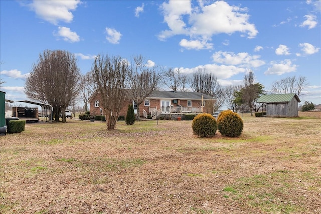 view of yard with a carport