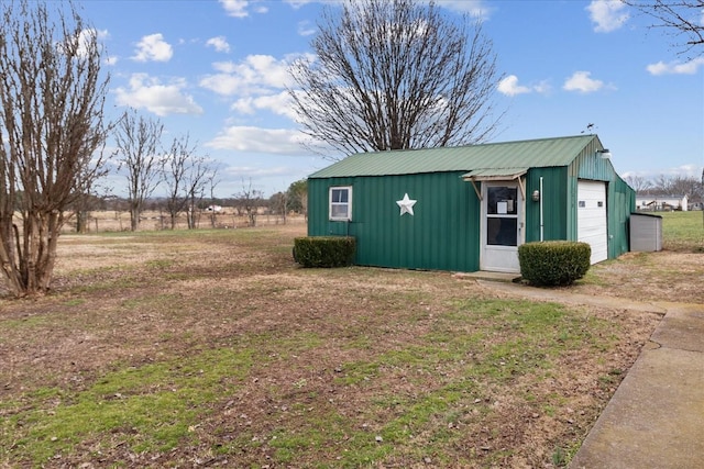 view of outdoor structure featuring a garage