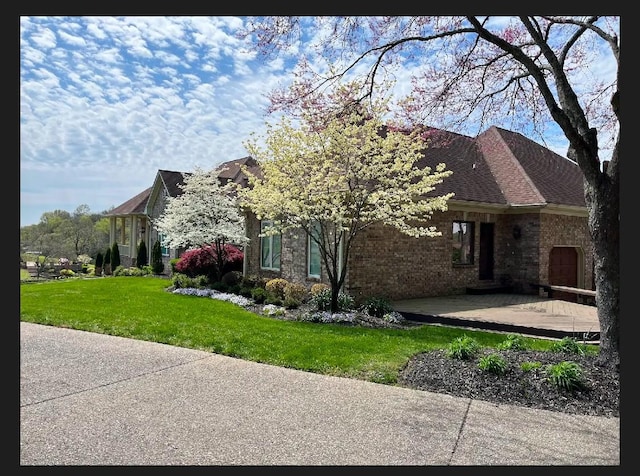 view of property exterior with a lawn