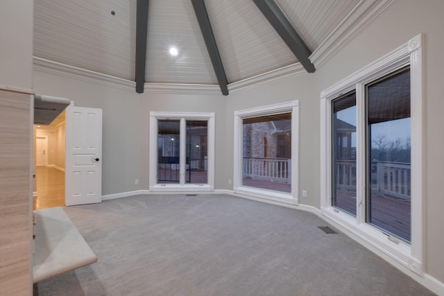 interior space featuring beamed ceiling, carpet floors, and high vaulted ceiling