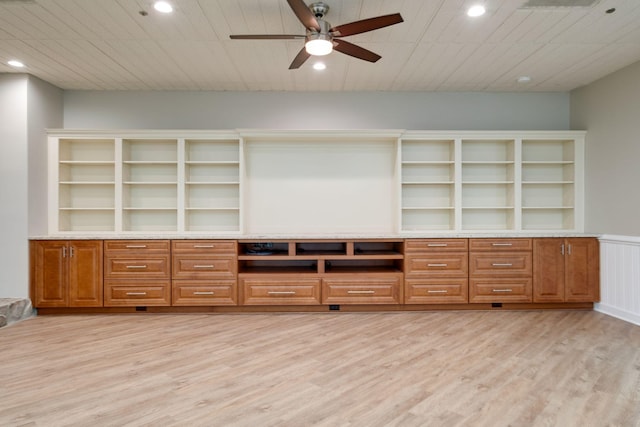 unfurnished office featuring ceiling fan and light wood-type flooring