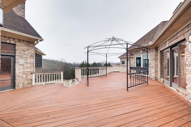 wooden deck featuring a gazebo