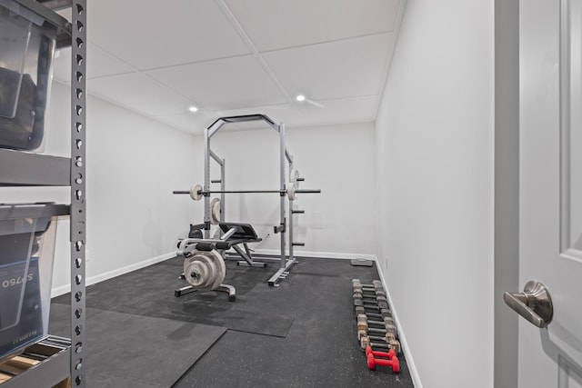 workout area with a paneled ceiling