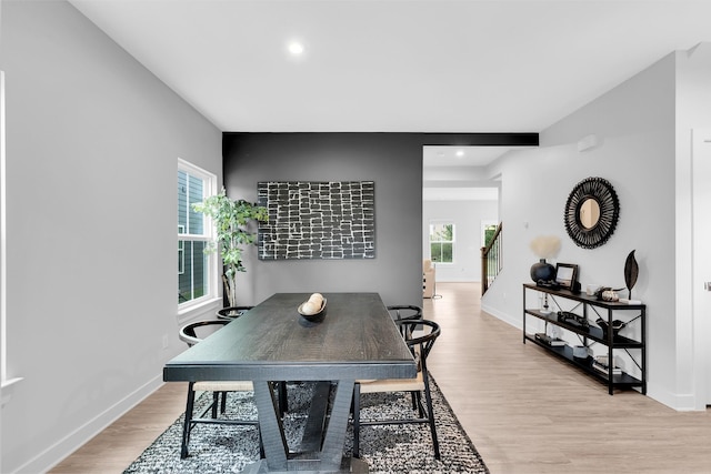 dining area with light wood-type flooring