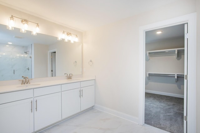 bathroom with vanity and walk in shower