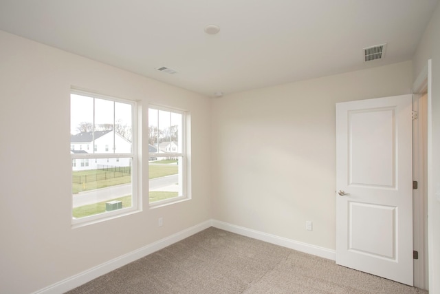 view of carpeted spare room