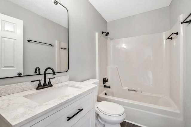 full bathroom with vanity, toilet, and tub / shower combination