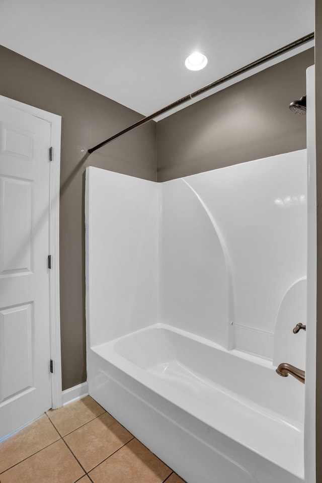 bathroom featuring tile patterned floors and bathtub / shower combination