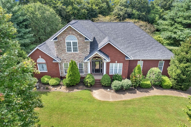 view of front of property with a front lawn