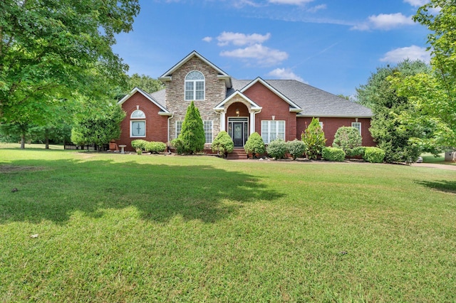 view of front of property with a front lawn