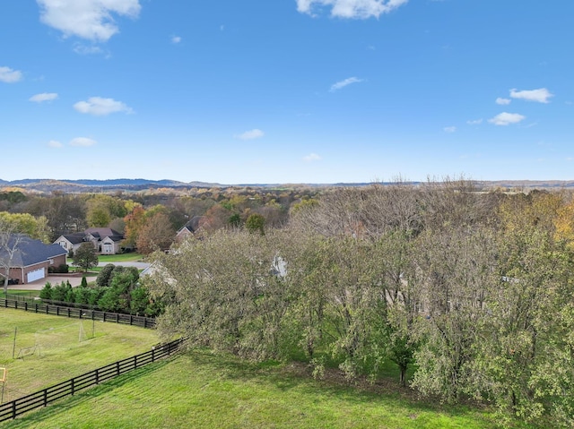 birds eye view of property featuring a rural view