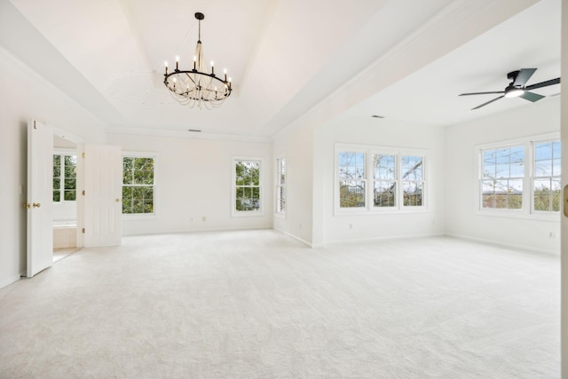 unfurnished living room featuring ceiling fan with notable chandelier and light colored carpet