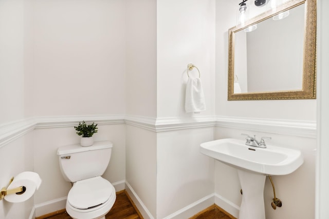 bathroom with sink and toilet