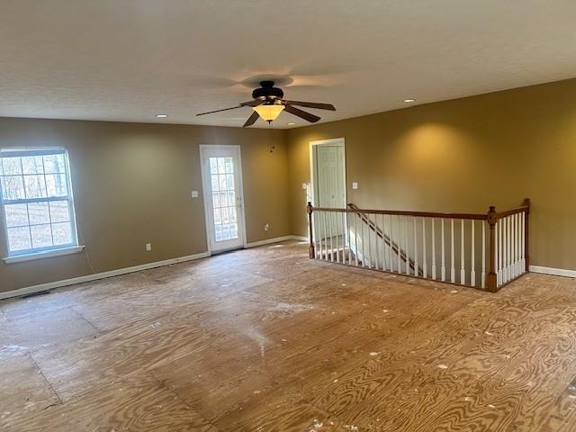 unfurnished room featuring a wealth of natural light