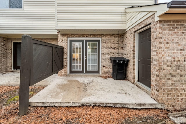 entrance to property featuring french doors