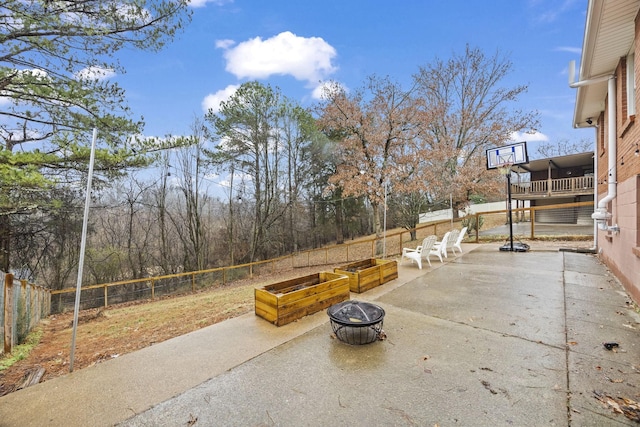 view of patio / terrace with an outdoor fire pit