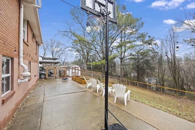 view of patio / terrace with a storage unit