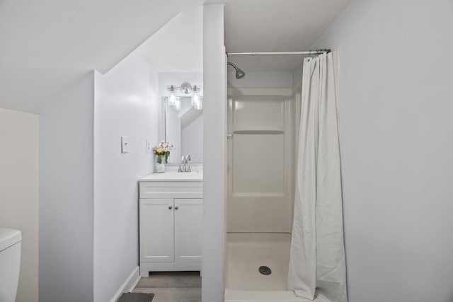 bathroom with vanity, curtained shower, wood-type flooring, and toilet