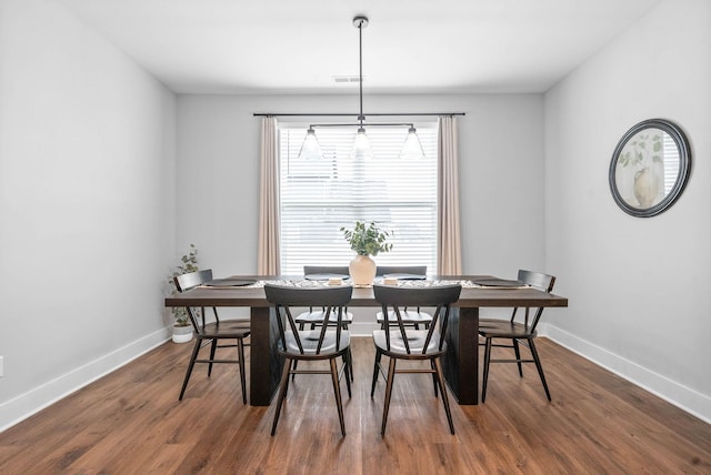 dining room featuring dark hardwood / wood-style floors